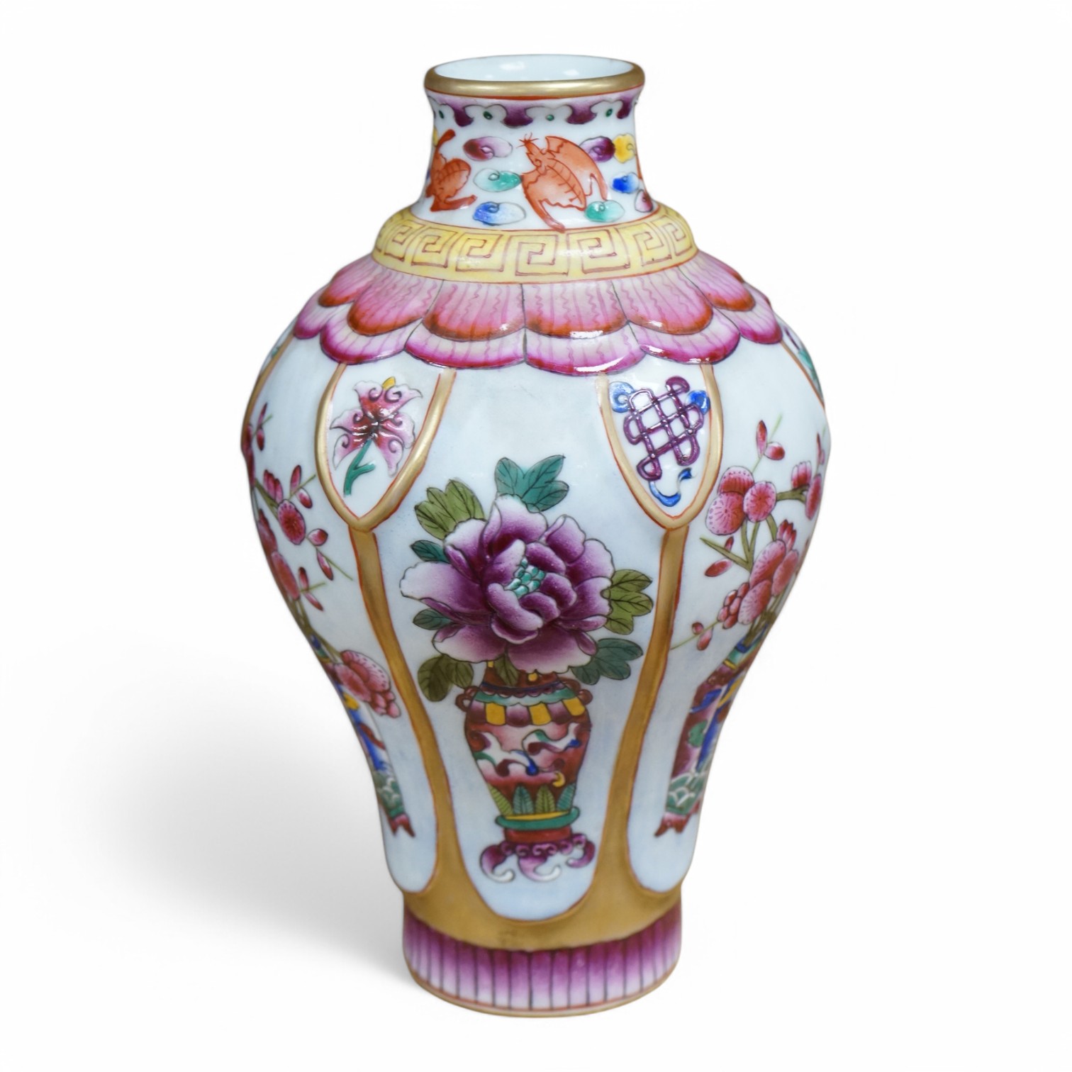 A Chinese famille rose vase enamelled with flowers, 20cm high. Condition - good